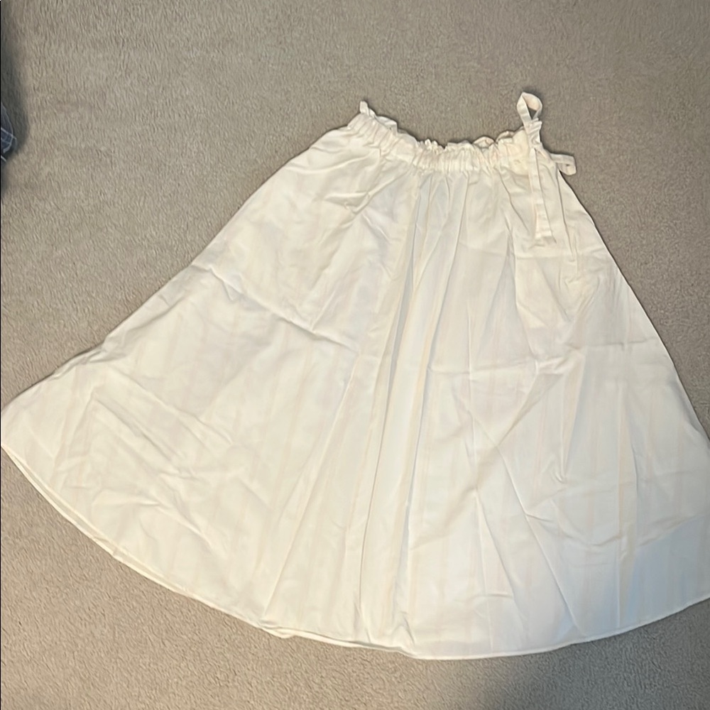 Cream and pale pink cotton Babaton skirt.